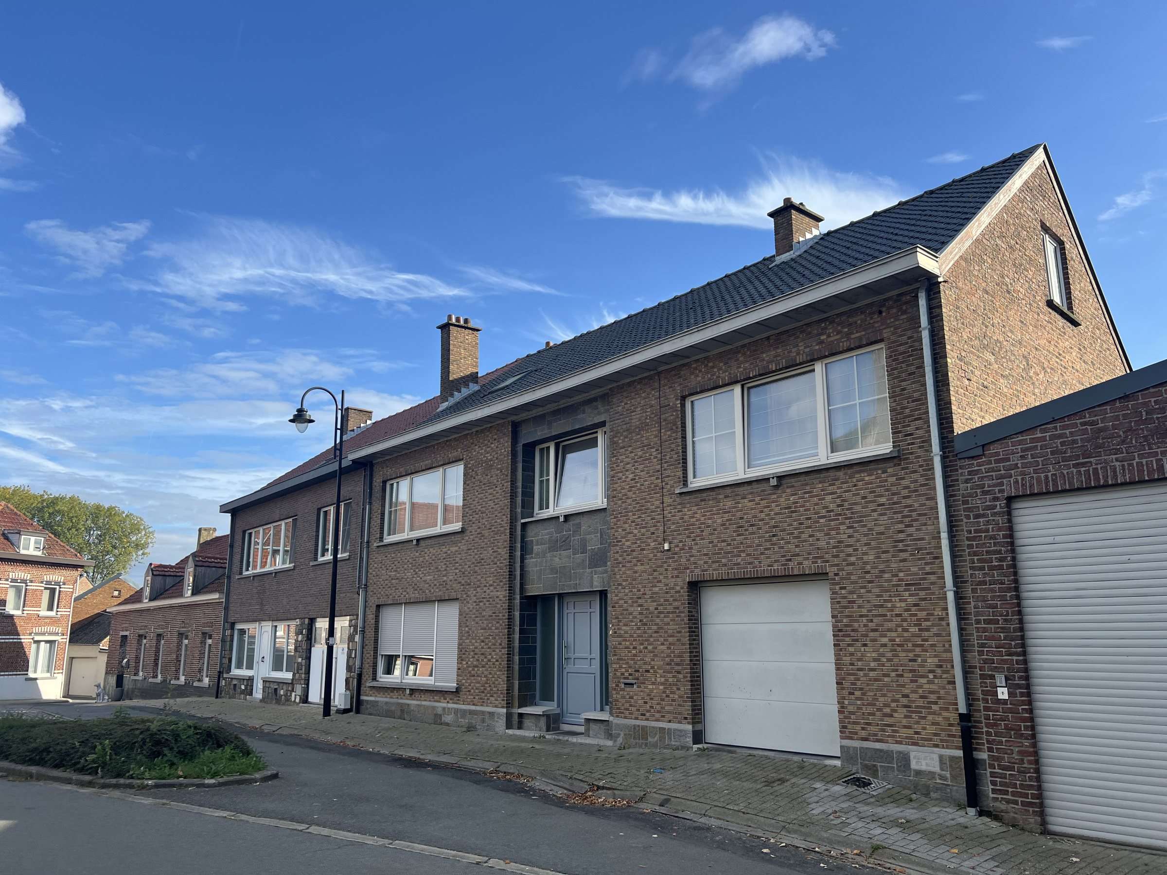 House 2 from the street, with its garage